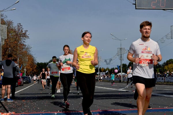 running a marathon Passing the finish line