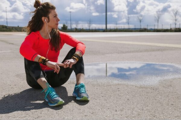 Runner resting quietly after a trail run in nature