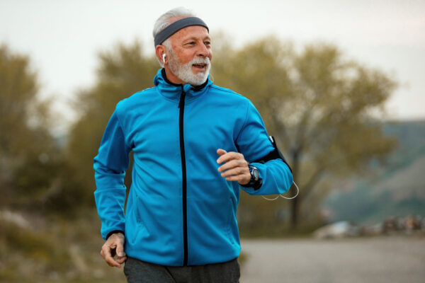 Mature runner enjoying a long-term running lifestyle outdoors