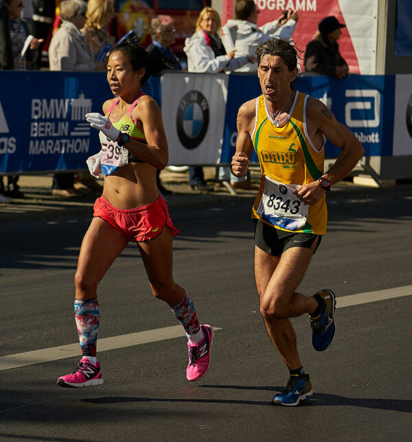 how to run for women man and woman run Berlin marathon