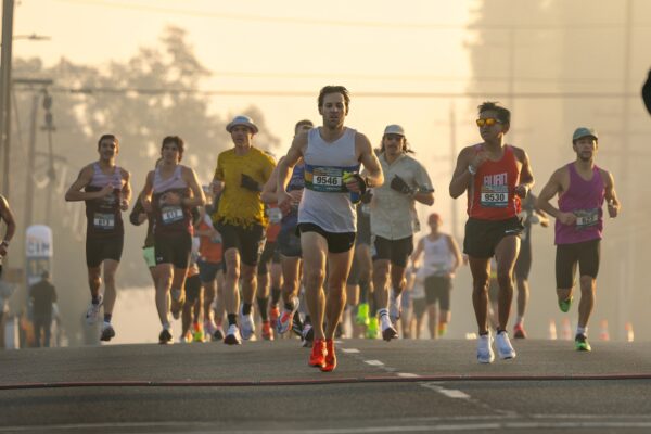 16 Weeks Marathon Training Schedule - runners out on the marathon route