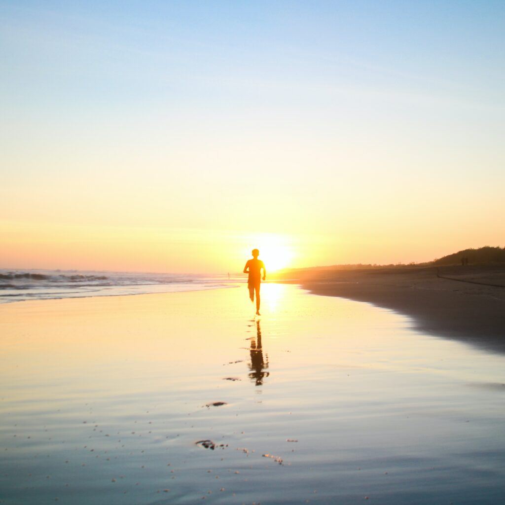 why-marathon-training-as-therapy-is-outstanding-Man-Running-At-The-Beach