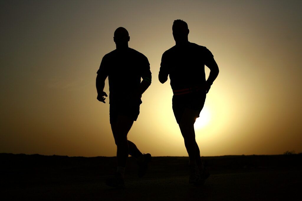 Xtreme-Xperience-In-A-Marathon-Makes-Powerful-Breakthroughs-Two-Runners-Silhuet