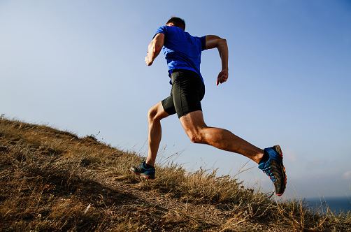 How to develop Marathon training for Outstanding Results man practicing hill training
