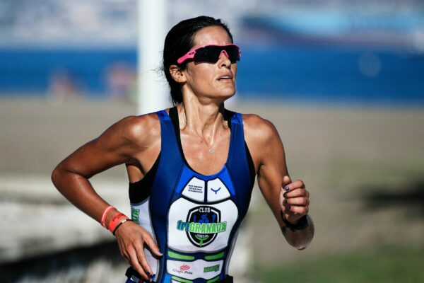 How to avoid symptoms of chemical imbalance in running beautiful woman running with sunglasses