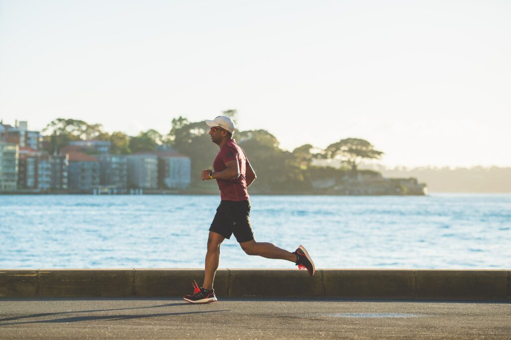10-Informative-Training-Tips - Makes-Breakthrough-In-a-Marathon-man-running-along-the-sea