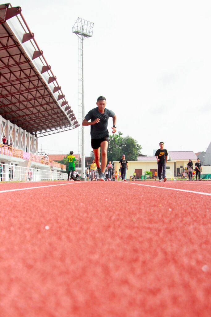 10-Informative-Training-tips - Makes-Breakthrough-In-A-Marathon-man-running-on-a-stadium