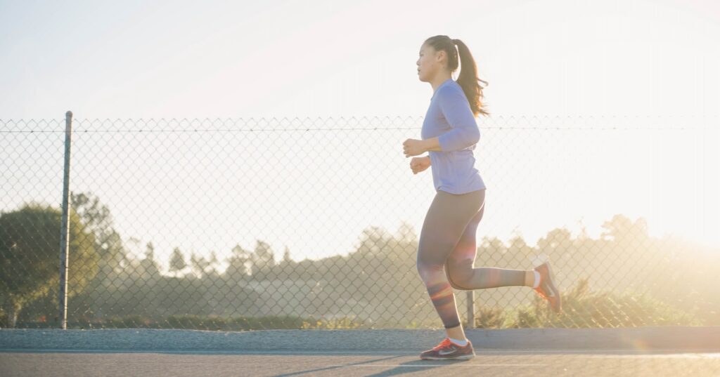 How-to-avoid-symptoms-of-chemical-imbalance-in-running- Woman-running-with-moderate-intensity