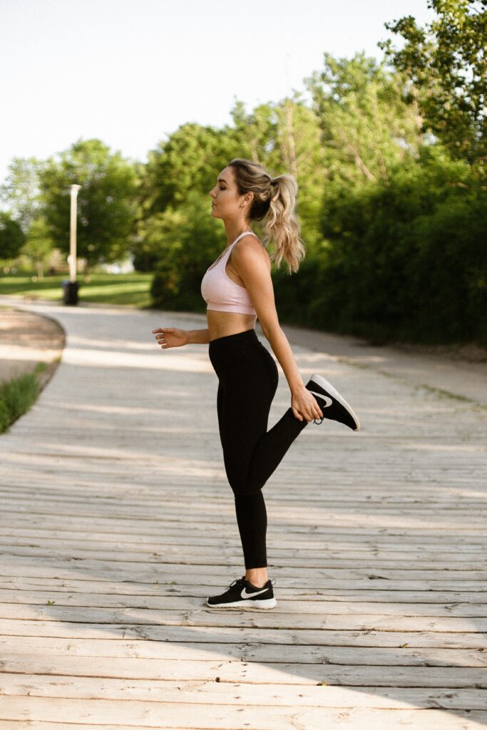 marathon-training-for-beginners-young-woman-stretching-before-marathon-training