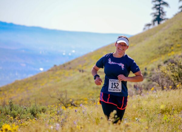 What Are The Benefits Of Running? woman Running in nature