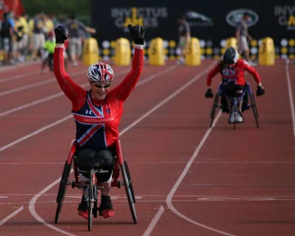  Discover How To Increase Your Running Motivation Woman in wheel chair winning a race