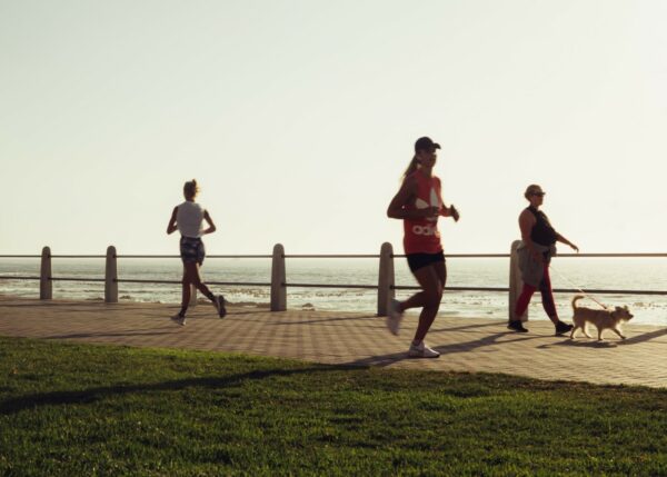 How To Run For Better Fitness Woman run along the beach side