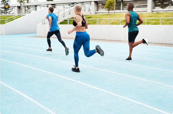 Runners doing interval training on a running track