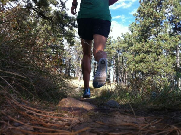 10 best reasons to start trail running with confidence trail runner on a forest path