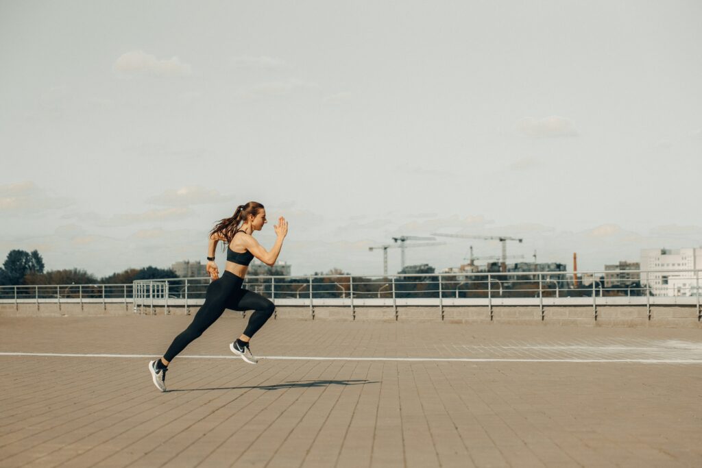 Best-Long-Distance-Running-Shoes-Woman-Running-on-concrete-stones-