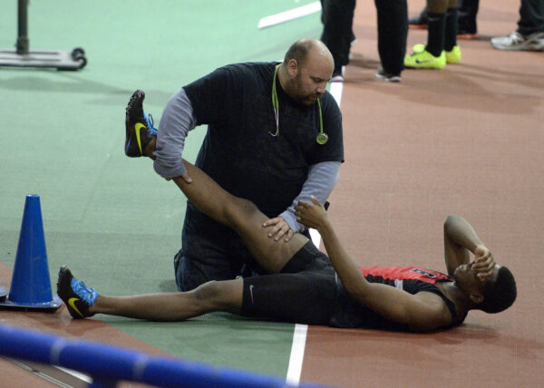 What Is The Treatment For Pulled Muscle? sprinter injured