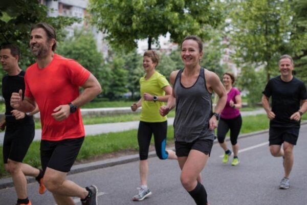 running tips for beginners - larger group of runners out running