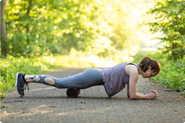 Types of Marathon Training - Marathon runner focusing on recovery and muscle care