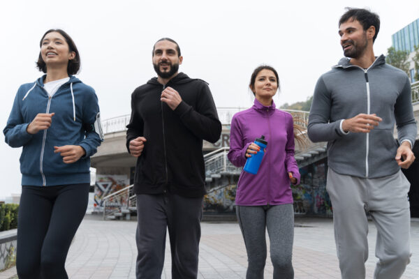 running tips for beginners - four runners out on an easy run.
